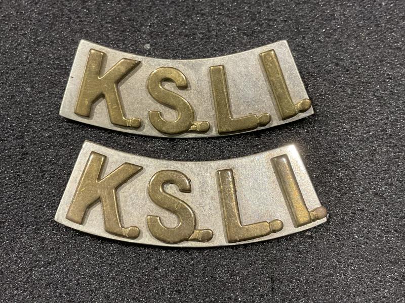 K.S.L.I unusual 2 part brass & white metal shoulder titles
