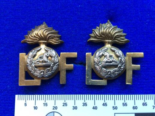 Lancashire Fusiliers bi-metal Shoulder Title, facing pair 