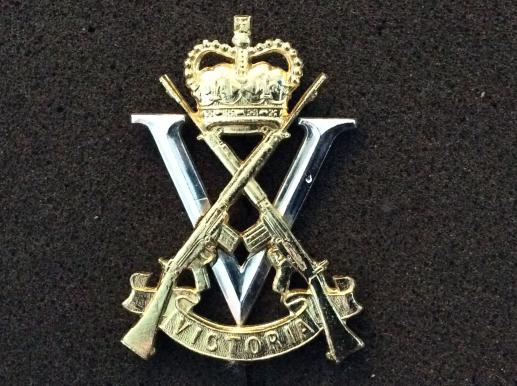 First Pattern Anodised Royal Victoria Regiment Hat badge
