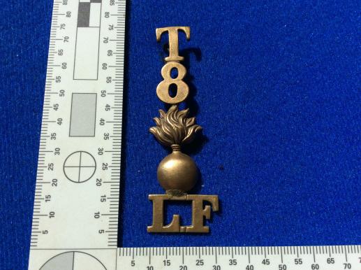 WW1 T8 Lancashire Fusiliers Brass Shoulder Title 