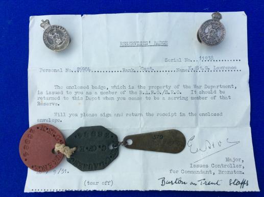 Dog tags, badges & Paperwork to Capt K. St.G. Lawrence 