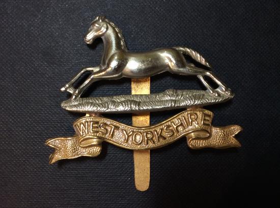 West Yorkshire Regiment bi metal cap badge