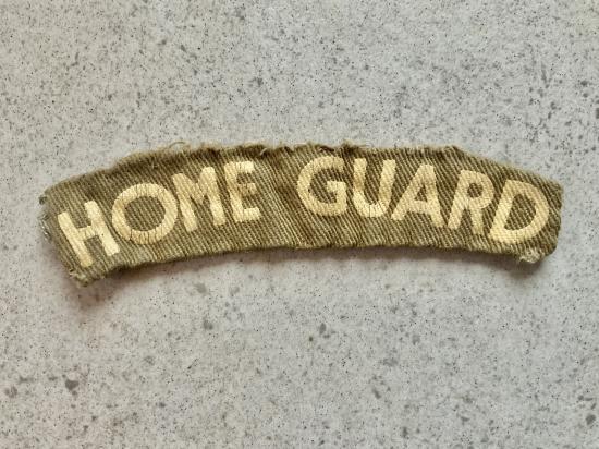 WW2 printed HOME GUARD shoulder title , removed from uniform