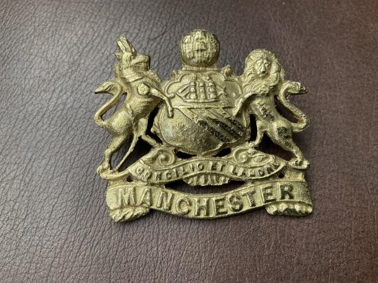 WW1 Egyptian made Manchester Regiment cap badge