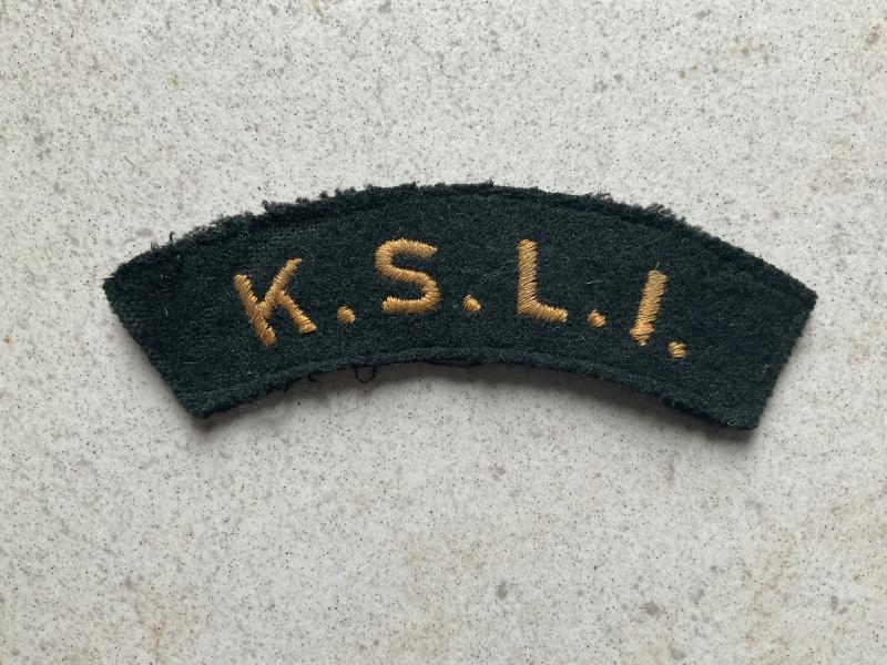 K.S.L.I cloth shoulder title, yellow on dark green backing