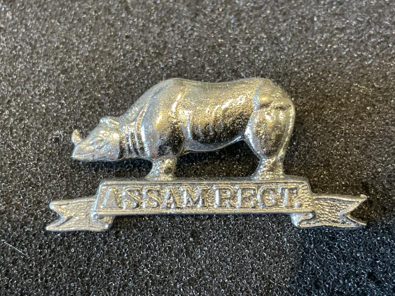 WW2 ASSAM REGT white metal cap badge