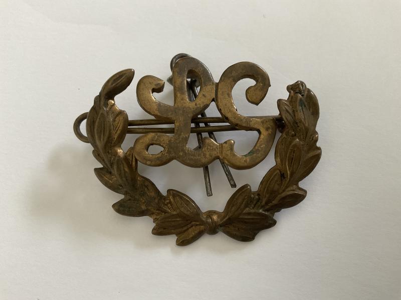 WW1 Lewis Gunners brass sleeve badge