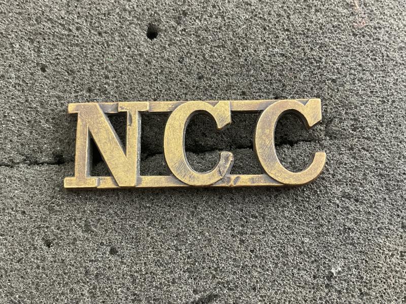 N.C.C (Non Combatant Corps) cap badge/shoulder title