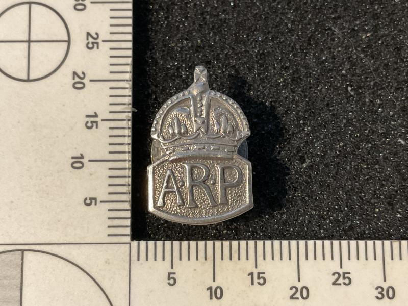 Miniature sterling silver marked A.R.P lapel badge