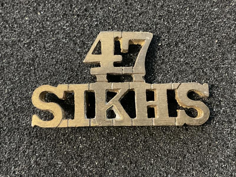 47th Sikhs brass shoulder title