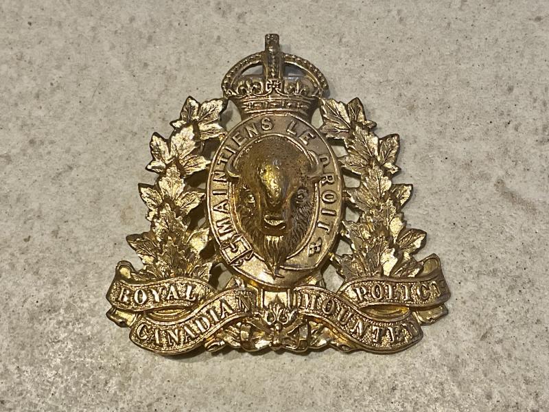 Post 1902 R.C.M.P Cap badge by J.R GAUNT.MONTREAL