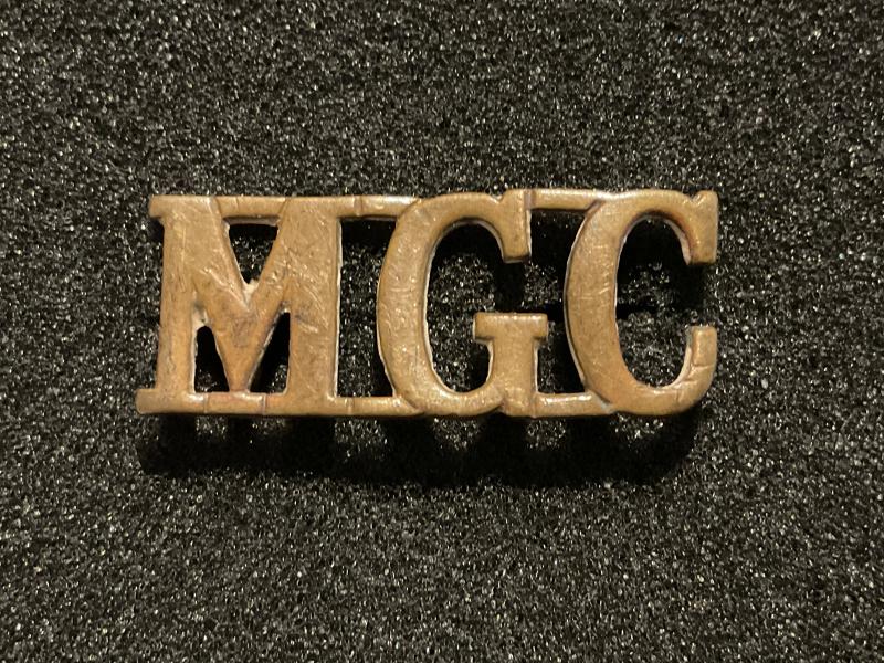 WW1 M.G.C (Machine Gun Corps) shoulder title