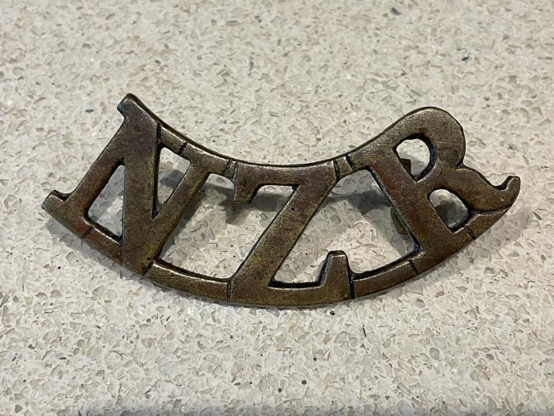 WW1 N.Z.R brass shoulder title by Gaunt London