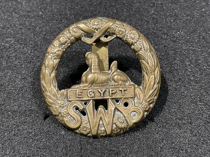 WW1 South Wales Borderers brass economy cap badge