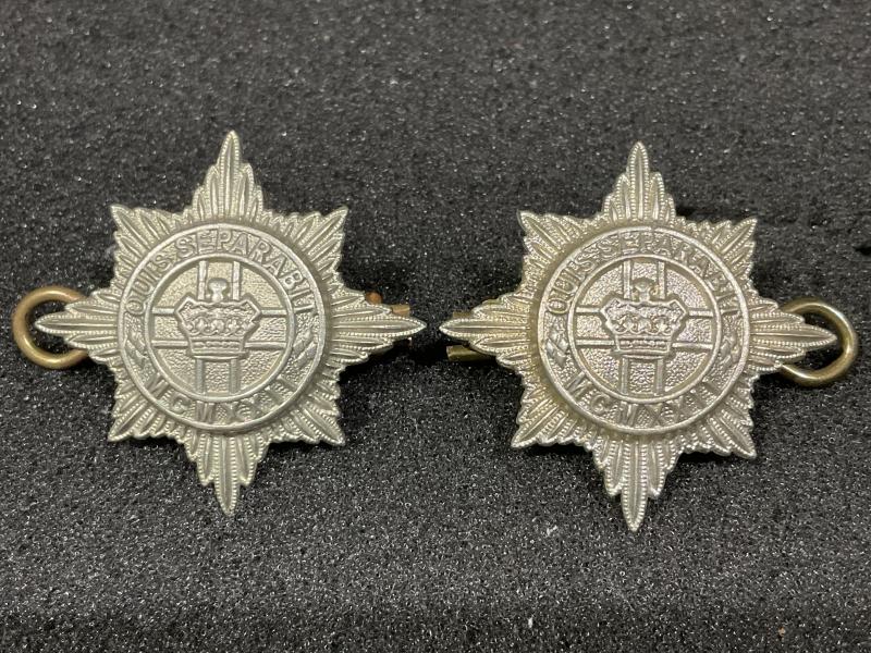 The 4th/7th Royal Dragoon Guards collar badges