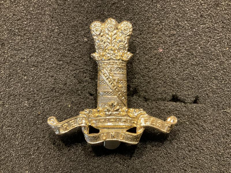 Anodised 11th Hussars cap badge by Firmin