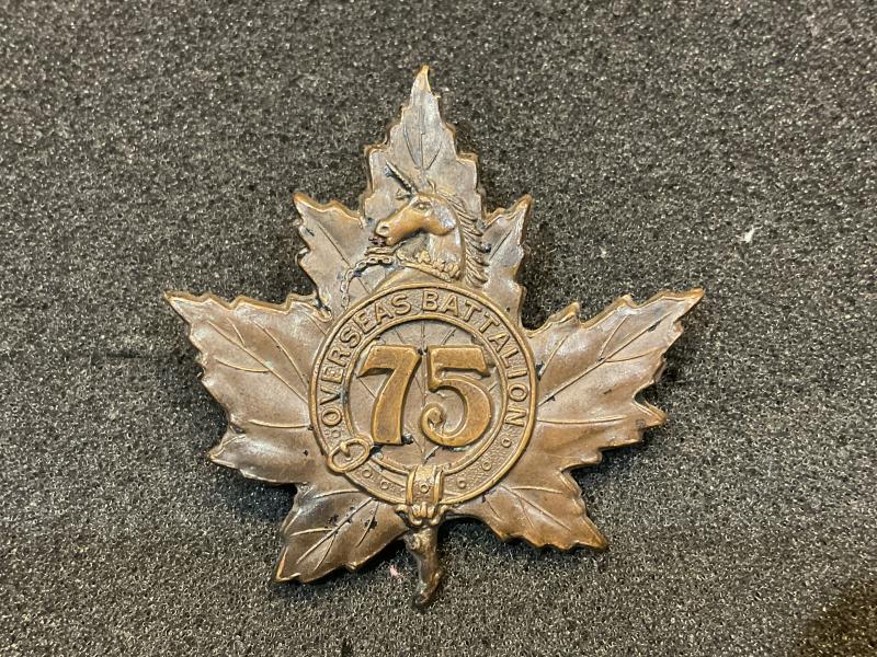 WW1 75th Infantry Battalion cap badge dated 1915