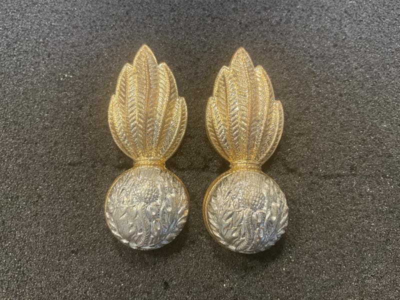 Royal Scots Fusiliers officers collar badges.