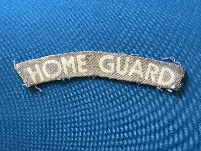WW2 Printed HOME GUARD cloth shoulder title.