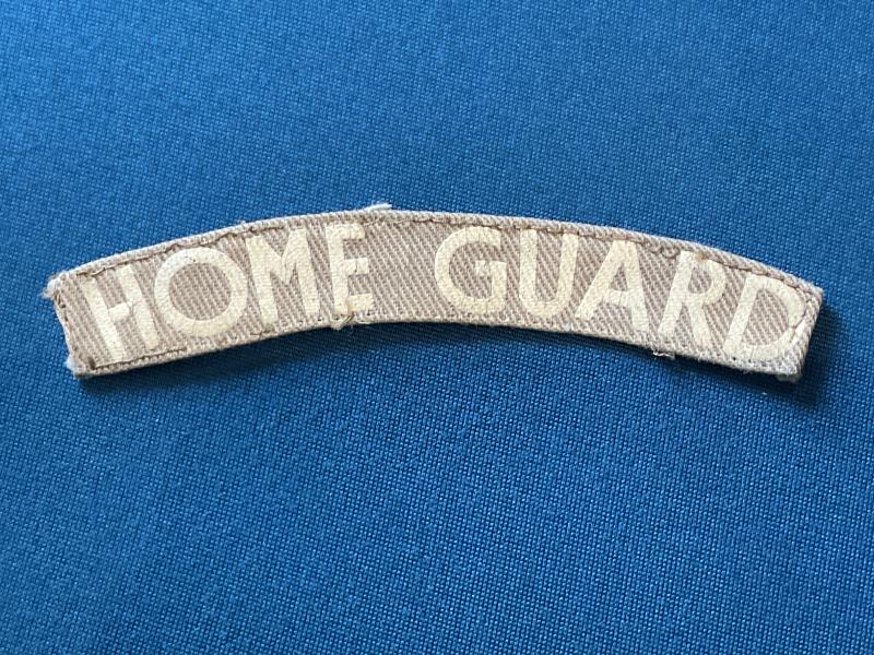 WW2 Printed HOME GUARD cloth shoulder title.
