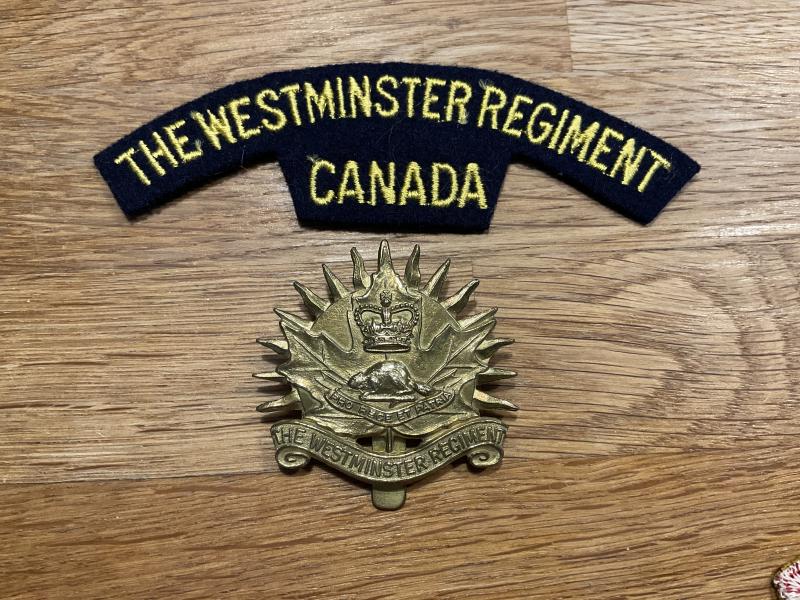 The Westminster Regiment of Canada cap badge & shoulder title.