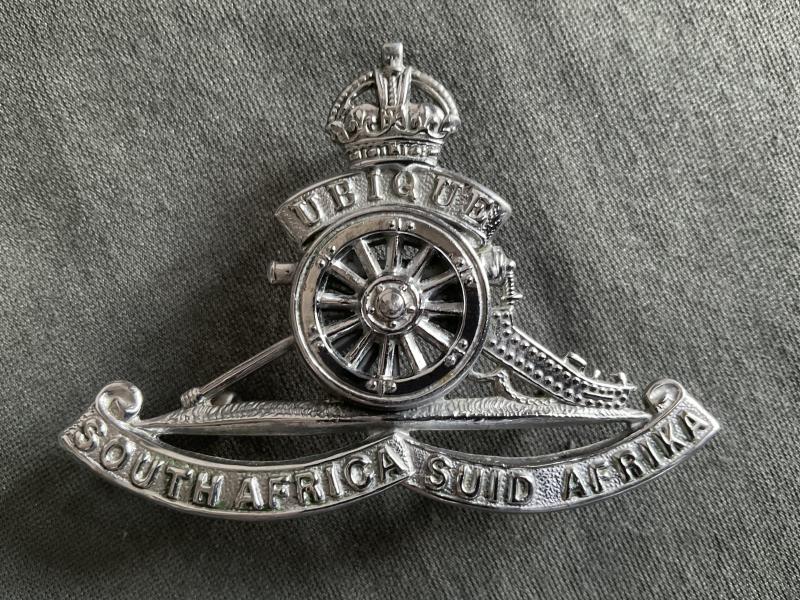 K/C South African Artillery chromed cap badge.